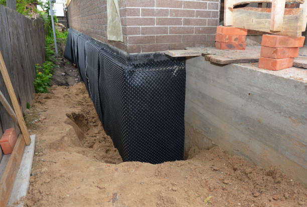 Happy homeowners after waterproofing job in Stephens City